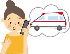 救急車を呼ぶ女性